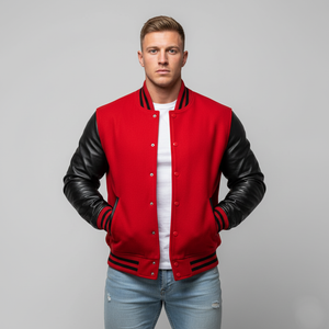 Man wearing a red and black varsity jacket on a gray background