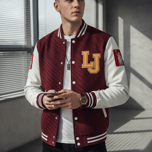 Person wearing a maroon and white varsity jacket with a 'LJ' logo, standing against a gray wall.