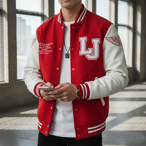Person wearing a red and white varsity jacket with a 'LJ' logo, holding a phone indoors.