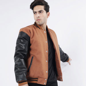 Varsity jacket right sleeve close-up premium leather arm ribbed cuff detail craftsmanship