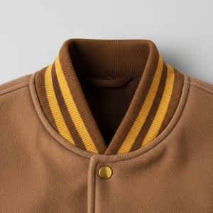 Brown jacket with a striped collar on a light gray background