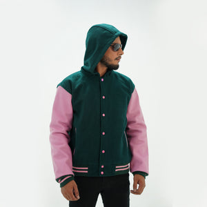 Side angle of dark green baseball letterman jacket with hood highlighting genuine cowhide leather arms and wool body