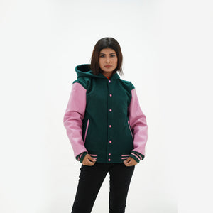 Detail of white leather sleeve with green and pink striped ribbed knit cuffs on hooded baseball jacket