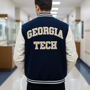 Person wearing a Georgia Tech letterman jacket in a hallway