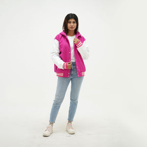 Full display of girls pink and white hooded letterman jacket showing complete hooded fit, leather arms, wool body, and trendy hooded varsity styling