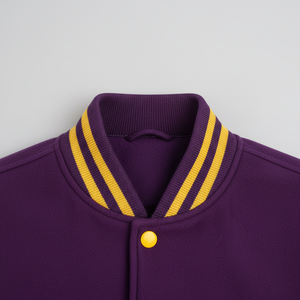 Purple jacket with yellow trim on a gray background