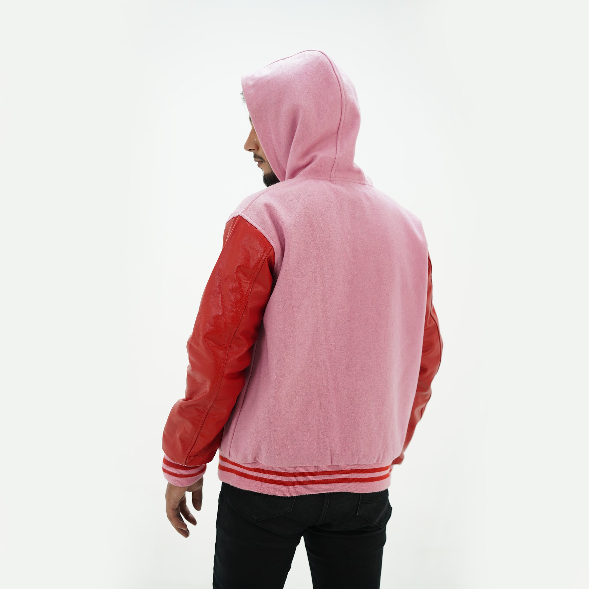 Back view of hooded varsity jacket showing premium wool body and leather sleeves letterman design