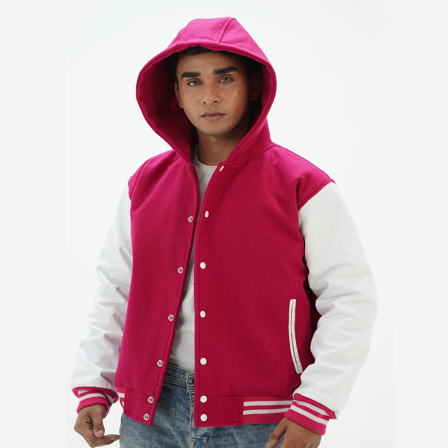 Side angle of letterman hoodie jacket highlighting leather arms and wool body varsity construction