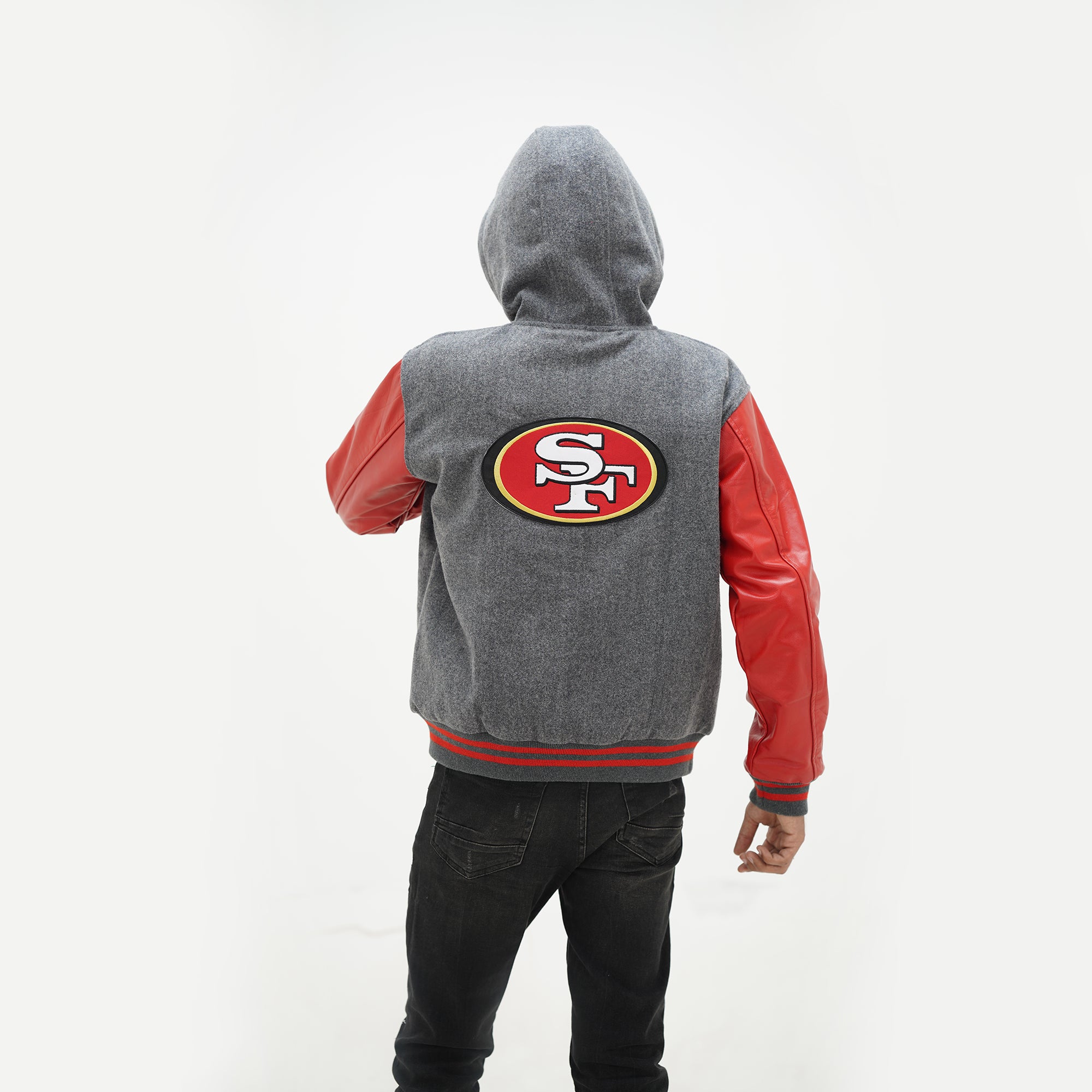 Back view of men 49ers varsity hoodie showing attached hood construction with grey wool body and red leather sleeve design for NFL wear