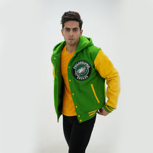 Side angle of men Philadelphia Eagles hoodie jacket showcasing yellow leather sleeves and kelly green wool body with attached hood