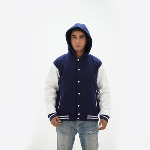 Detailed view of men's navy blue varsity jacket with hood featuring ribbed cuffs and premium wool leather construction