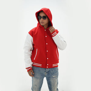 Detailed view of men's red and white varsity jacket with hoodie featuring custom embroidery options and premium materials