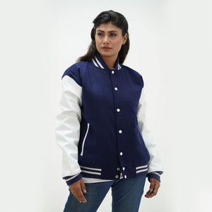 Navy blue letterman jacket women side angle - showcasing sophisticated navy wool body with leather arms and ribbed cuffs