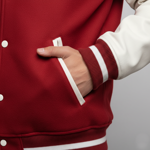 Red varsity jacket with white trim on a plain background