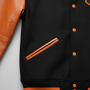 Black varsity jacket with orange buttons and trim on a light gray background
