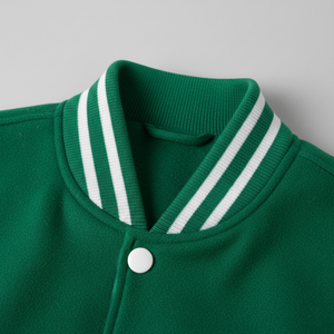 Green jacket with white striped collar on a gray background