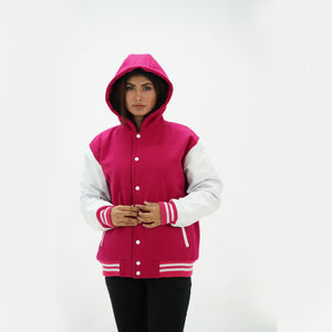 Detail of white leather sleeve with pink and white striped ribbed knit cuffs on girls hooded letterman jacket