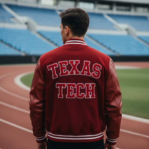 Person wearing a Texas Tech jacket on a track and field