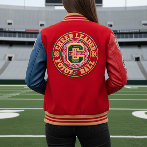 Person wearing a red letterman jacket with 'Cheer Leader Football' design on a football field.
