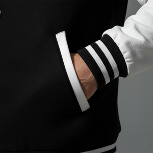 Detailed view of Venom varsity jacket genuine leather sleeves with authentic varsity style and school spirit design
