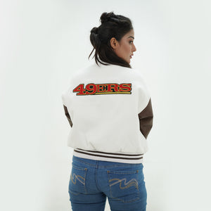 Side profile of women 49ers varsity jacket showcasing chocolate leather arms and premium wool body back for female football fans