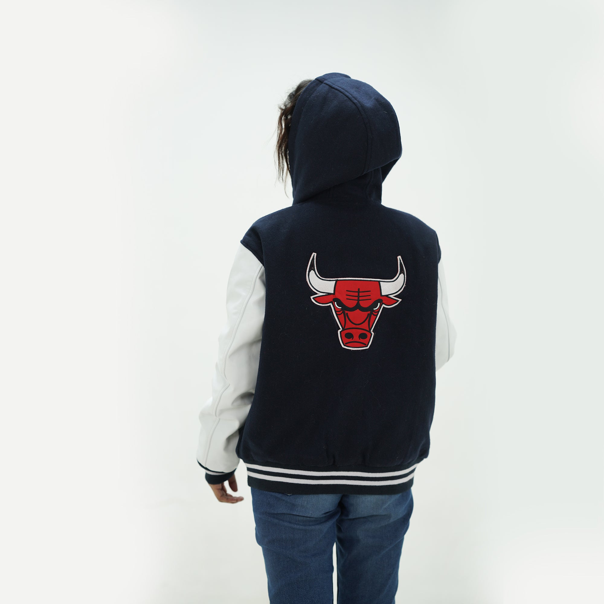 Back view of women Bulls varsity hoodie showing hood and tailored construction with wool, leather design for ladies basketball fans
