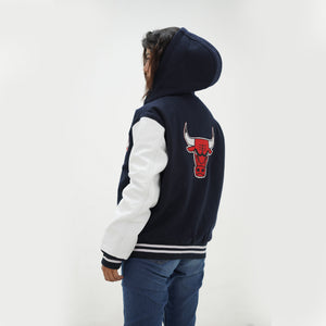 Three quarter angle of women Chicago Bulls hooded jacket highlighting premium wool body and genuine leather sleeves for female fans