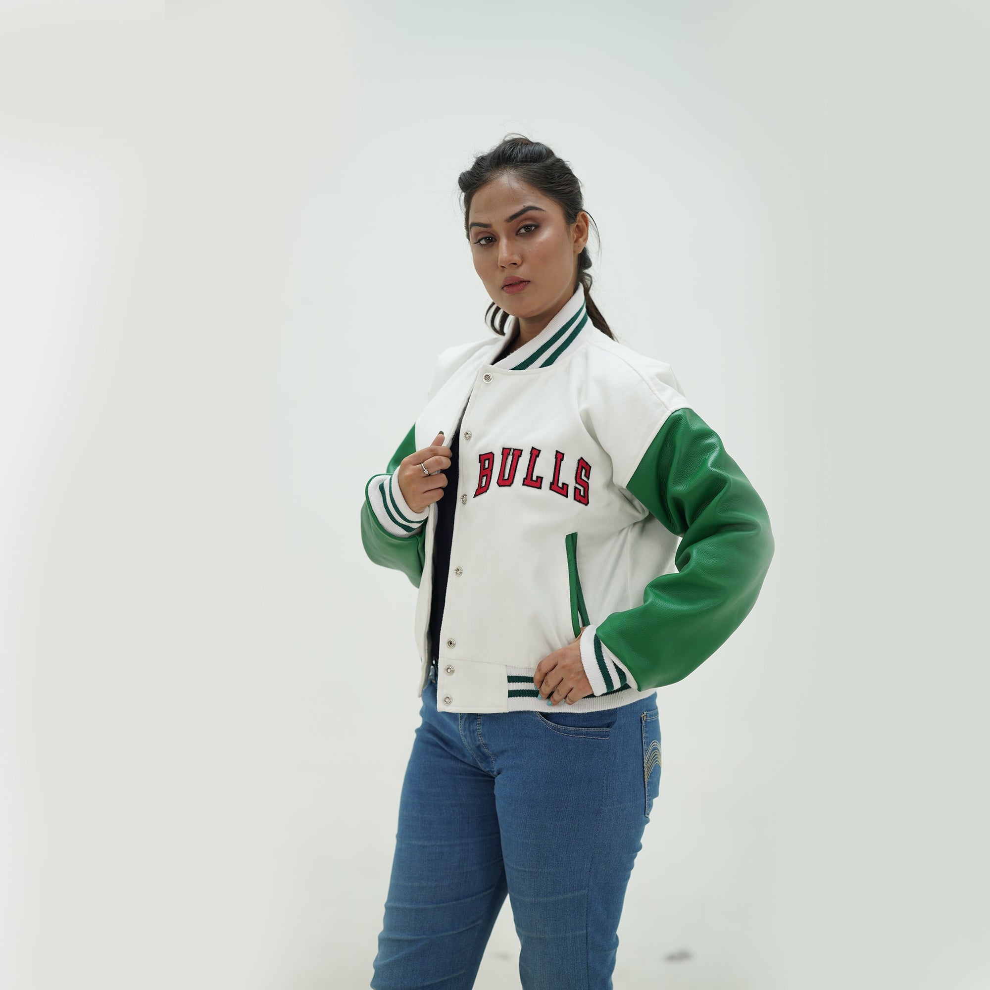 Front view of women Chicago Bulls letterman jacket displaying ribbed knit trim in team colors with tailored fit for female basketball fans