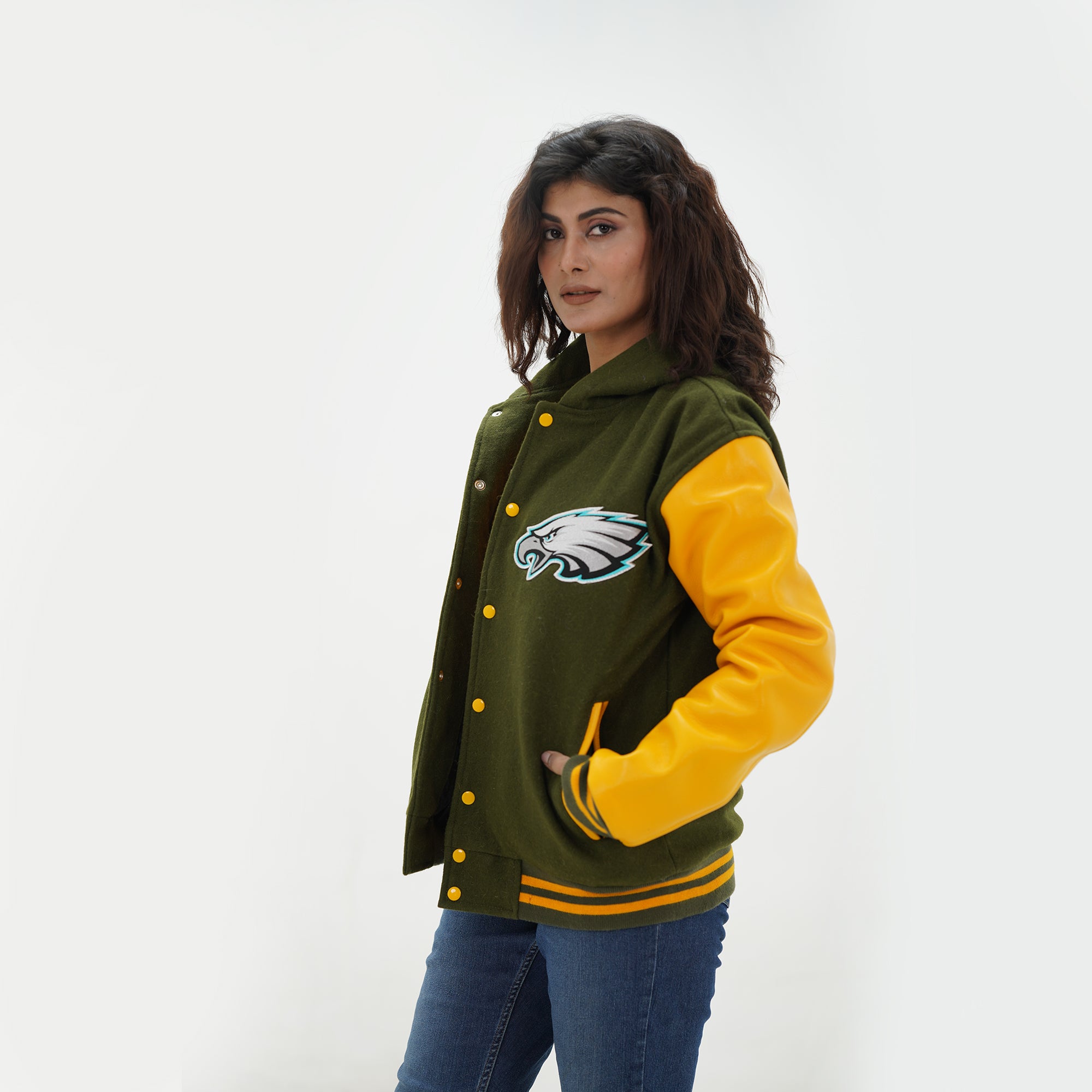 Side angle of women Philadelphia Eagles letterman jacket showcasing yellow leather sleeves and premium green wool body for ladies football fans