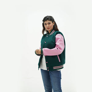 Women's green baseball jacket side angle - highlighting feminine tailored fit with genuine leather sleeves and dark green ribbed cuffs