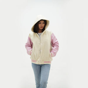 Women's hooded varsity jacket three-quarter angle displaying white leather sleeves and off white wool body construction