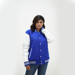 Women's leather sleeve varsity jacket in vibrant royal blue - classic ribbed collar and cuffs design