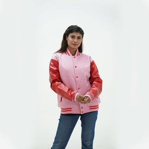 Side profile of women's red wool varsity jacket with pink genuine leather sleeves showing ribbed cuffs and tailored feminine silhouette