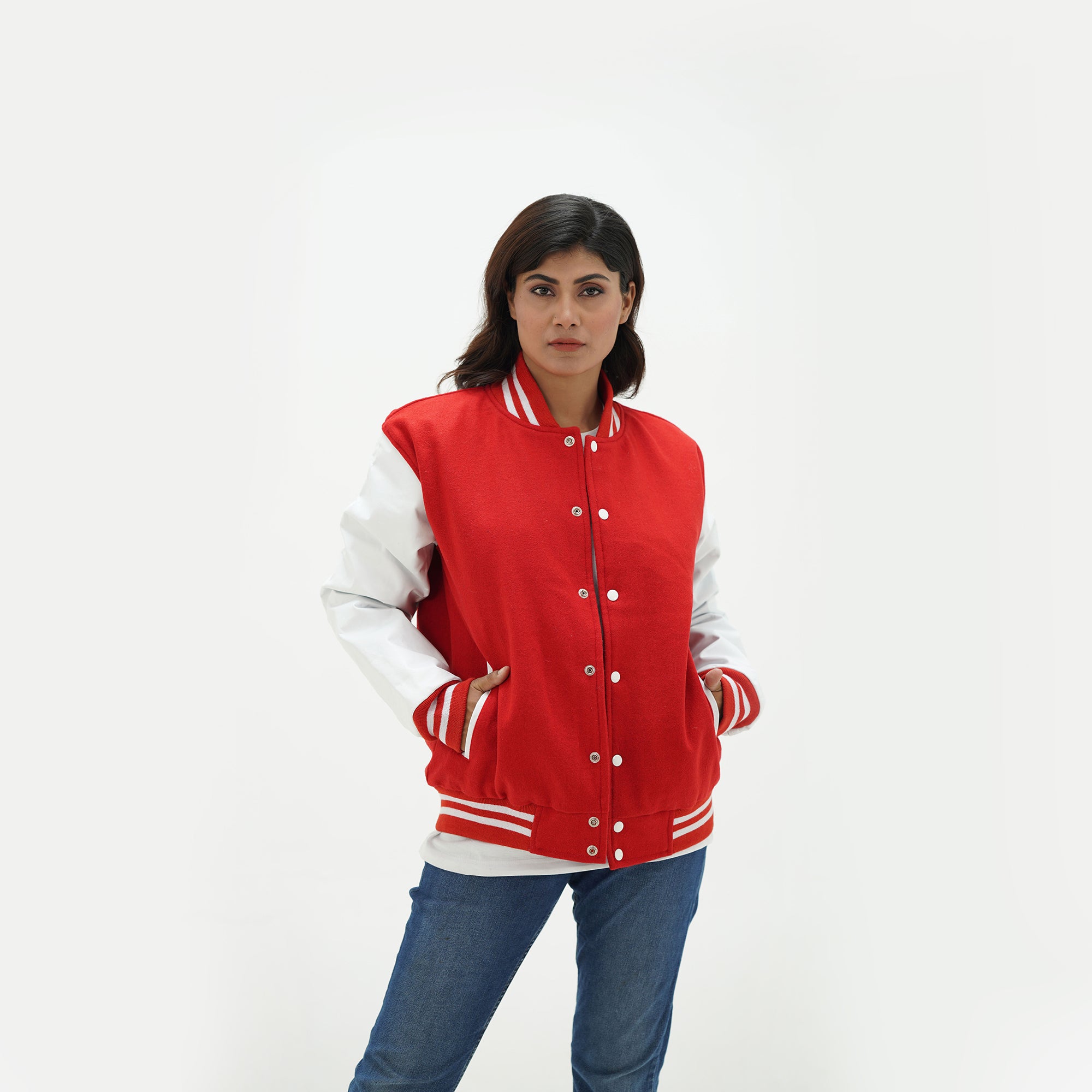 Women's red varsity jacket three-quarter view - highlighting feminine tailored fit with white leather sleeves and red wool body