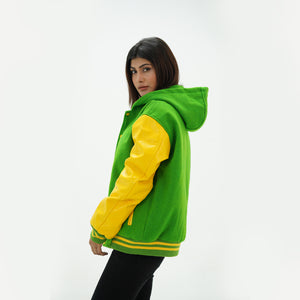Detail shot of yellow genuine leather sleeve with green yellow striped ribbed knit cuffs on women's varsity hoodie