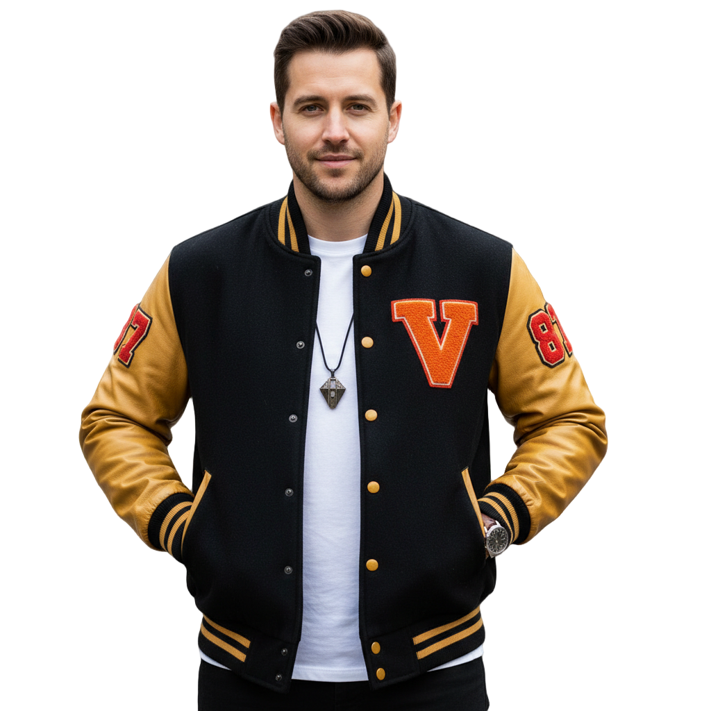 Man wearing a black and gold varsity jacket with letterman design 