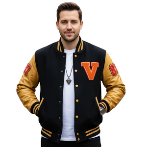 Man wearing a black and gold varsity jacket with letterman design 