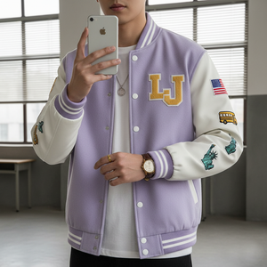 Person wearing a purple and white letterman jacket with 'LJ' initials, holding a phone.