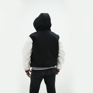 Back view of black and white letterman jacket with hoodie showing premium Melton wool construction and timeless design