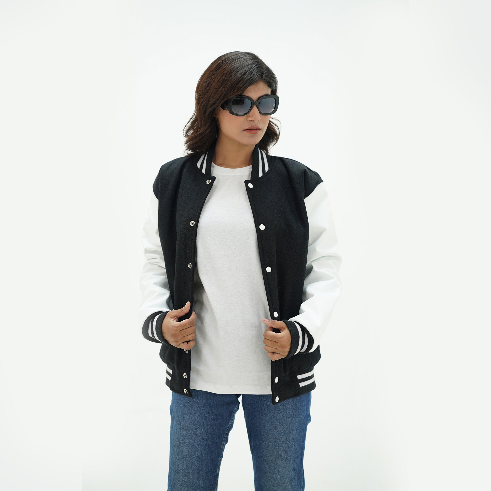 Black and white letterman jacket women open view - showcasing black wool body with white leather arms and coordinating ribbed hem