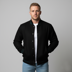 Black wool letterman jacket with premium construction worn over white shirt - iconic varsity style for men
