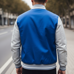 Person wearing a blue and gray jacket on a street