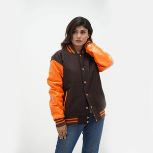 Brown and gold letterman jacket three-quarter view - highlighting old gold leather sleeve flexibility and ribbed knit trim
