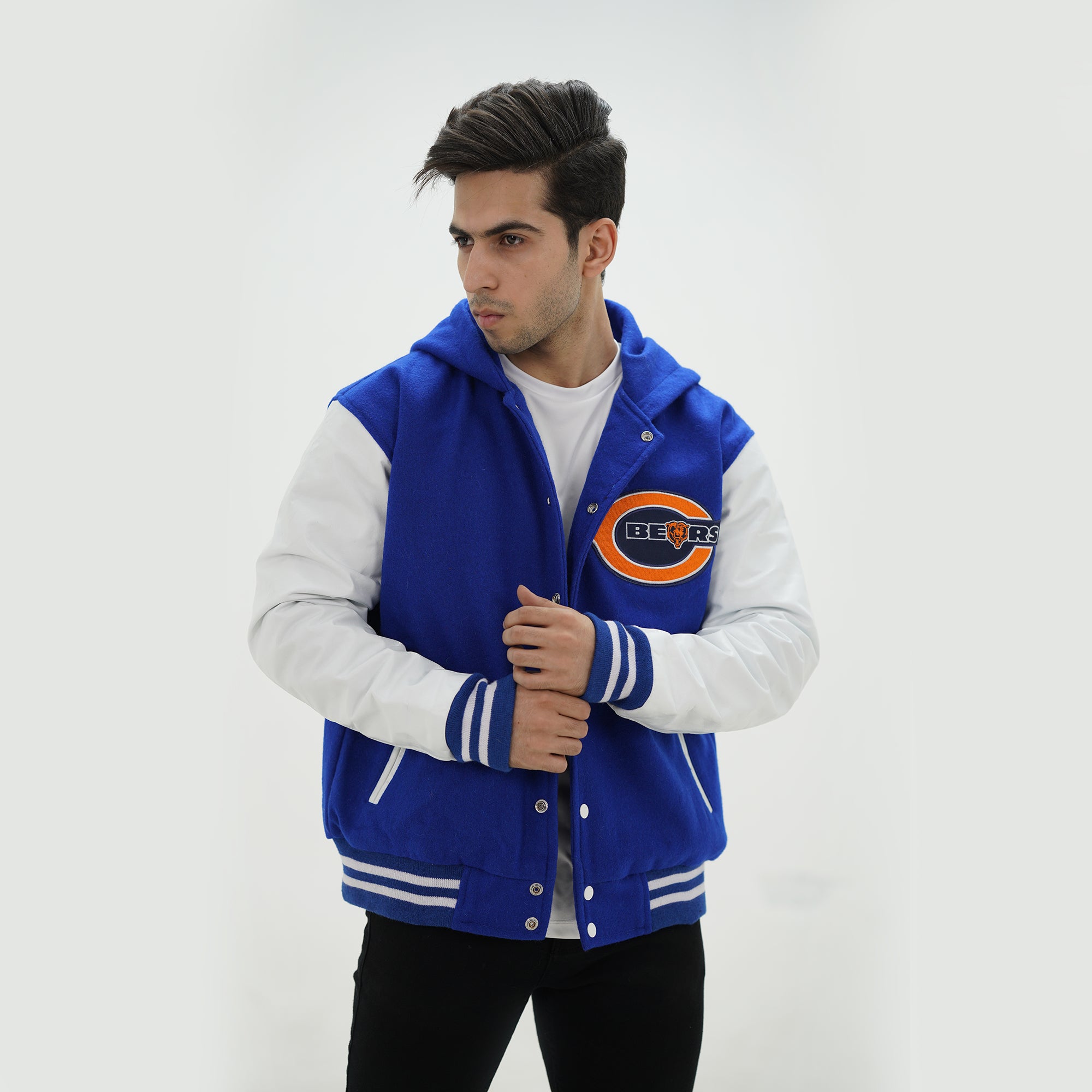 Side profile of Chicago Bears hoodie jacket showcasing white leather sleeves and attached hood for extra warmth in royal blue
