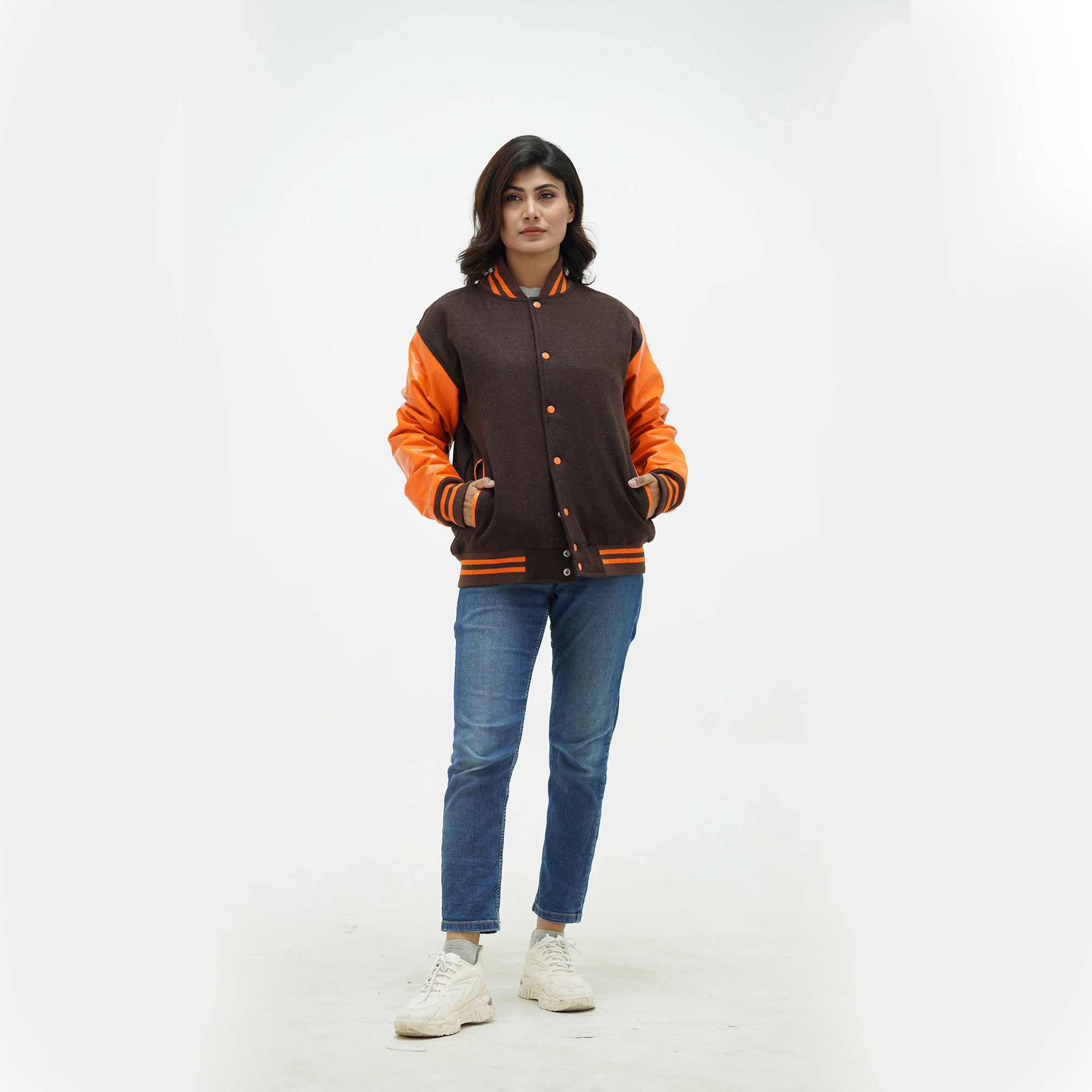 Chocolate brown varsity jacket full body fit - featuring old gold leather arms, snap buttons, side pockets, and classic ribbed waistband