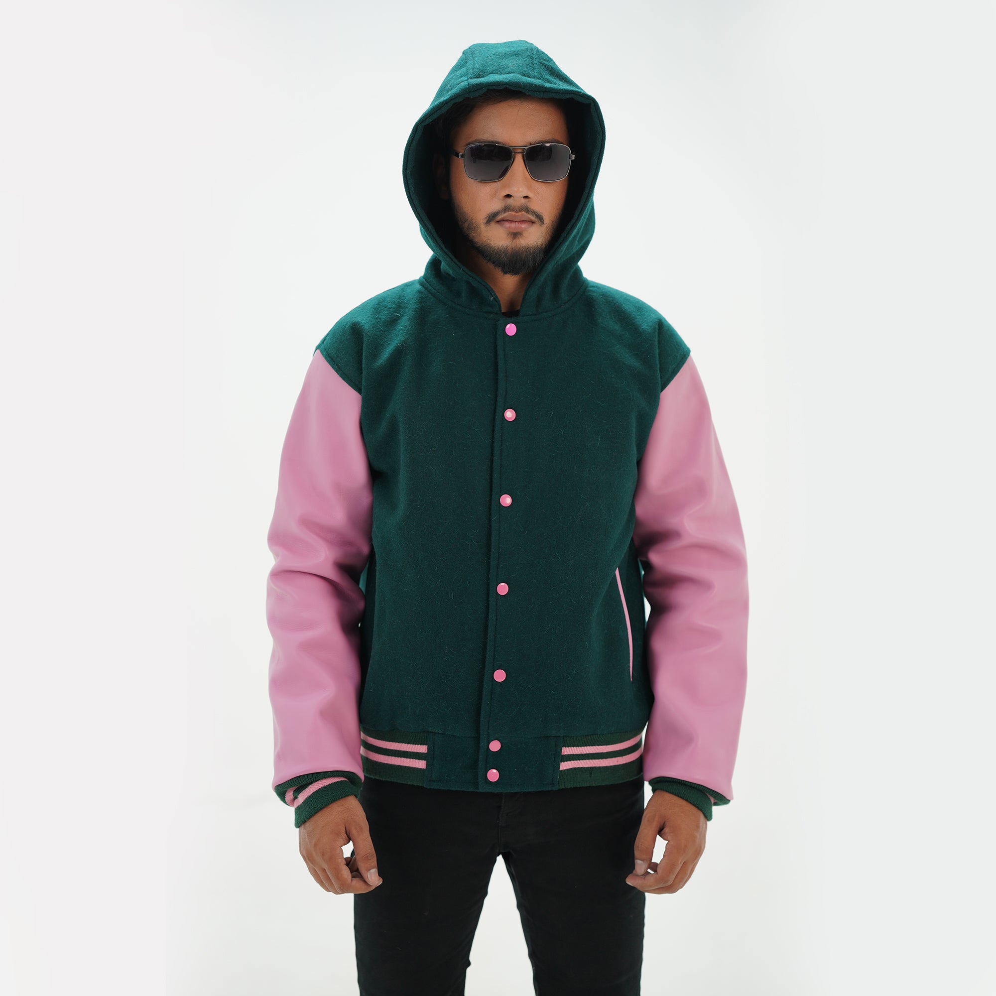 Close-up detail of dark green hooded varsity letterman jacket premium materials and baseball styling