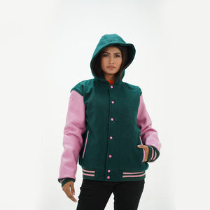 Detail of pink leather sleeve with green striped ribbed knit cuffs on hooded baseball jacket