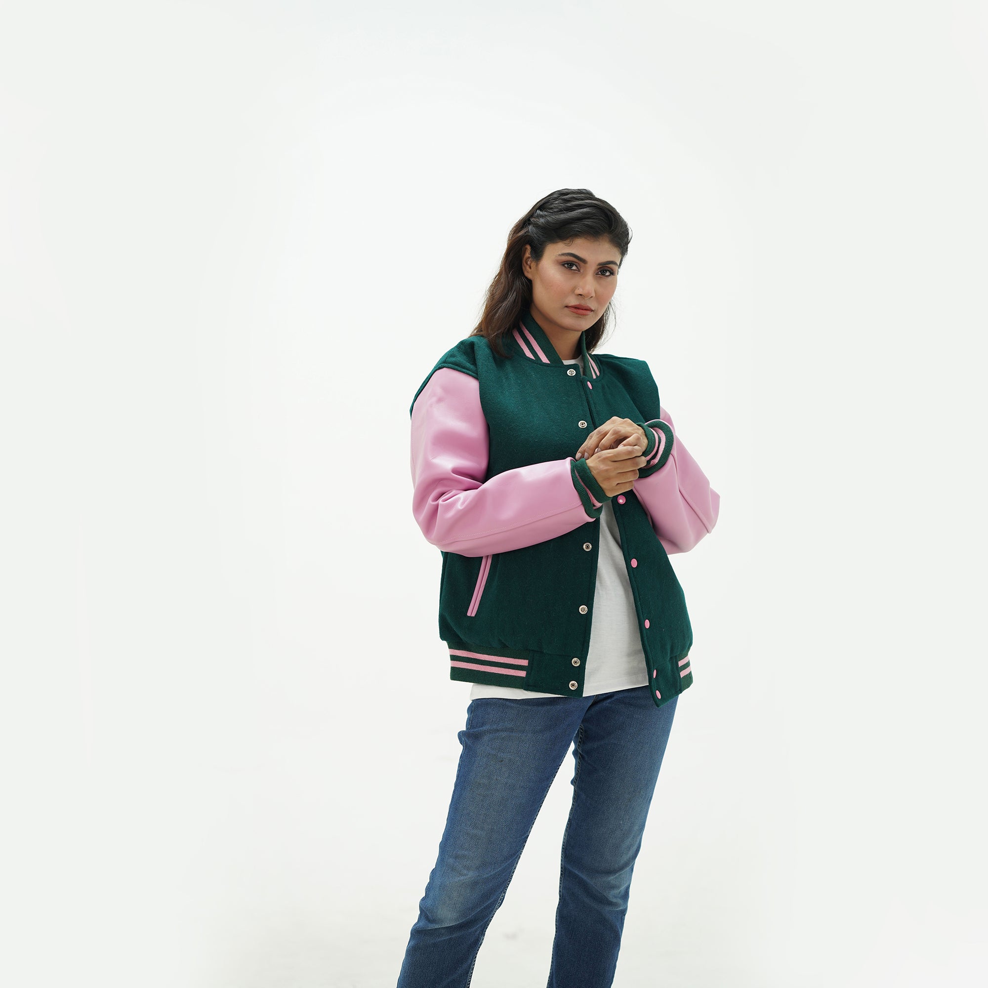 Forest green varsity jacket women close-up - showing ribbed collar construction with dark green striped trim and snap button hardware
