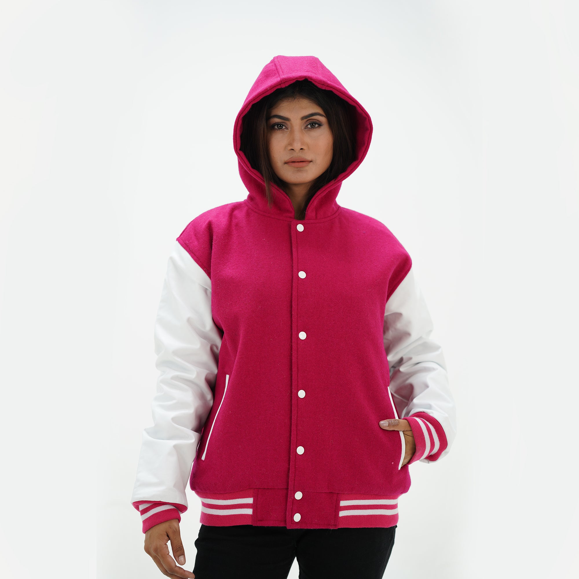 Girls pink and white hooded letterman jacket front view with white leather sleeves and snap button closure