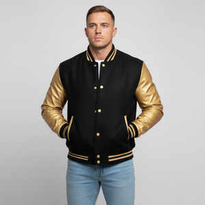 Man wearing a black and gold varsity jacket on a gray background